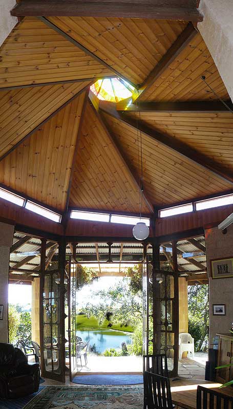 vertical panorama of the main room looking towards the water view